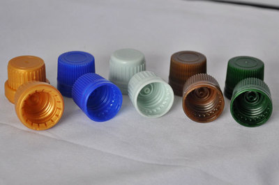 供應18口徑精油瓶用塑料蓋 大頭保險蓋與防盜蓋的全面解析